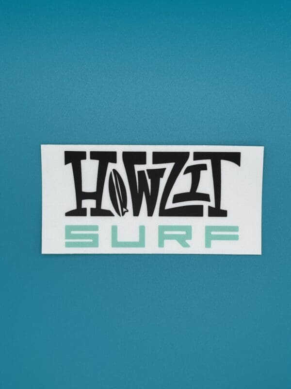 Howzit Surf sticker on blue background.